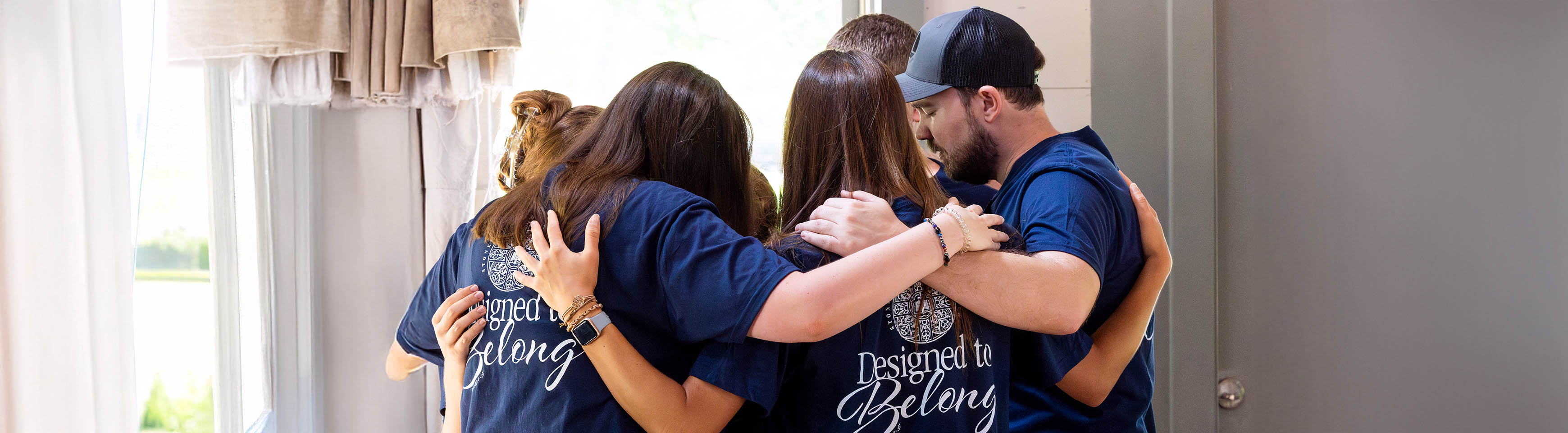 photo: young adults praying together