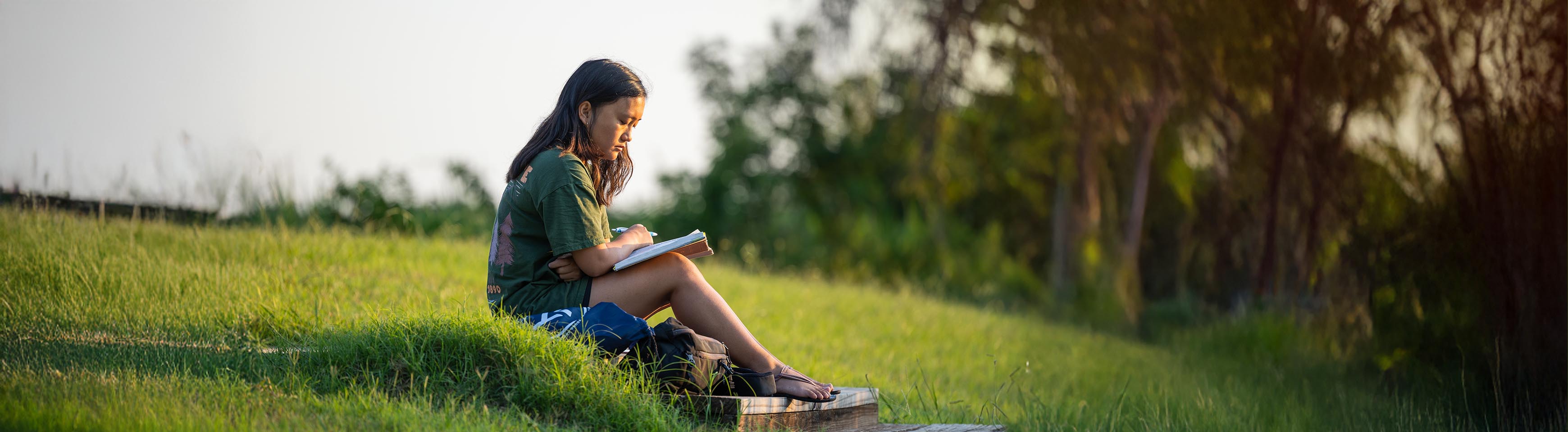 photo: young professional reading her bible
